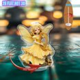 thumbnail image 1 of Rotating acrylic ornament featuring an angelic figure in a pastel yellow dress with iridescent wings holding a golden harp surrounded by ornate bowls, 1 of 6