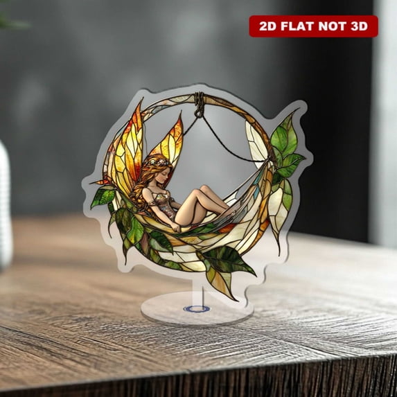 Rotating acrylic ornament featuring a fairy in a leaf hammock with vibrant stained glass textures and intricate metal line details. Fantasy art on a white background
