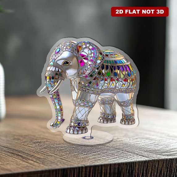 Rotating acrylic ornament featuring a translucent stained glass Indian jeweled white elephant reflecting rainbow light with an elegant sophisticated design and white background