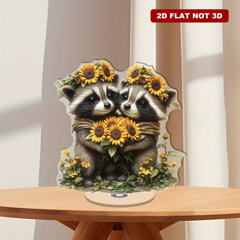 Rotating acrylic ornament featuring two charming raccoons adorned with ...