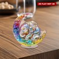thumbnail image 1 of Rotating acrylic sculpture of a baby elephant sleeping on a crescent moon with vibrant colors and exquisite details against a white background, 1 of 8
