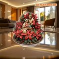 thumbnail image 1 of Rotating acrylic standee features the holy family surrounded by vibrant poinsettias and holly on a round base with stunning details, 1 of 7