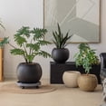 thumbnail image 1 of Round Magnesium Clay Planter, 1 of 10