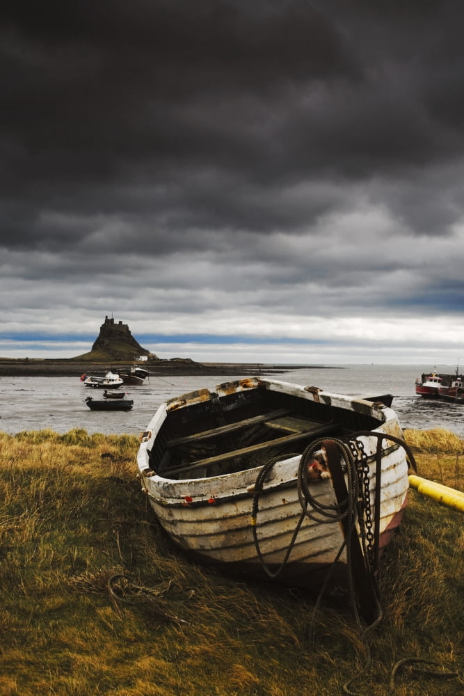 Row Boat On The Volcanic Shore Of Beblowe Craig England Canvas Art - John Short Design Pics (11 x 17)