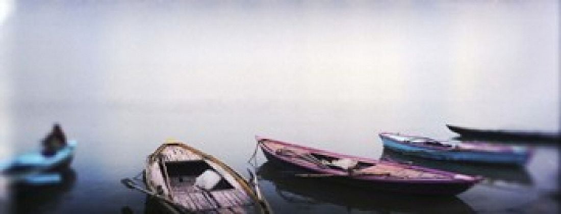 Row boats in a river Ganges River Varanasi Uttar Pradesh India Canvas Art - Panoramic Images (15 x 6)