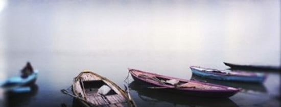 Row boats in a river Ganges River Varanasi Uttar Pradesh India Canvas Art - Panoramic Images (30 x 12)