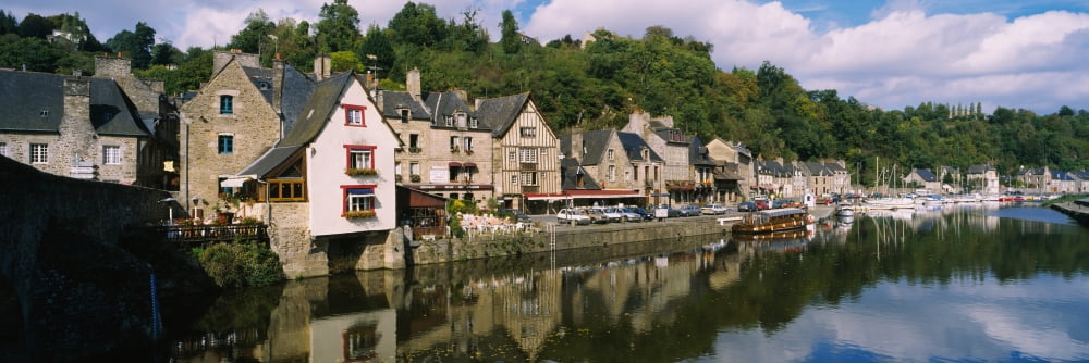 Row house at the waterfront Rance River Dinan Brittany France Canvas Art - Panoramic Images (12 x 36)