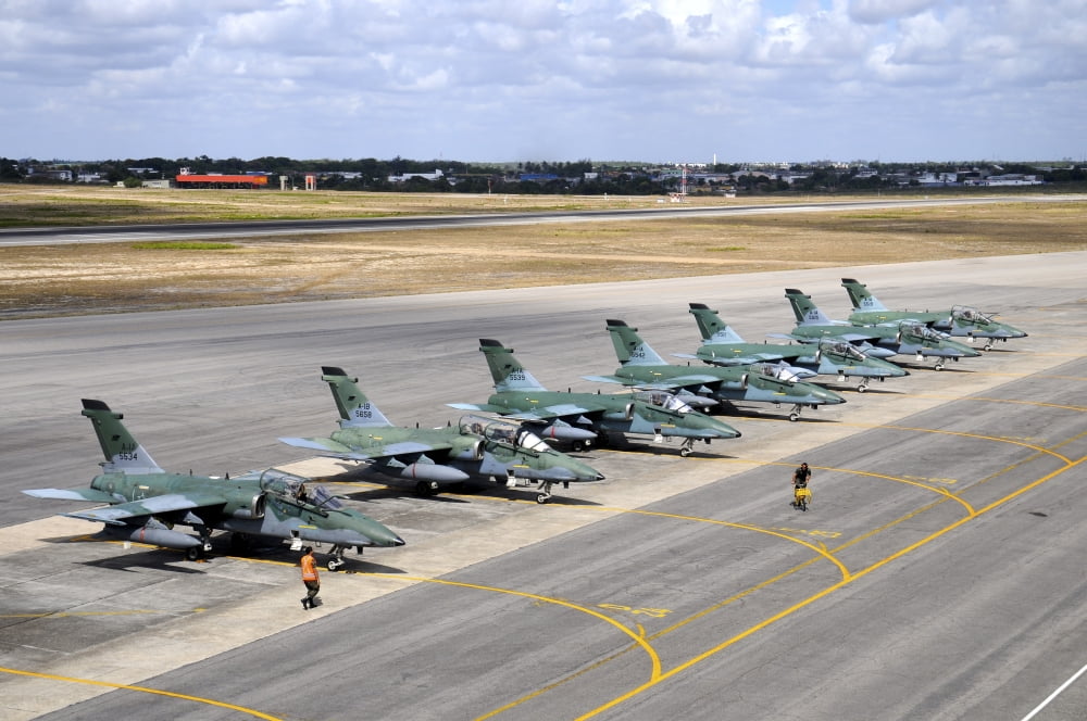 Row of Brazilian Air Force A-1B (AMX) aircraft at Natal Air Force Base Brazil Canvas Art - Riccardo NiccoliStocktrek Images (34 x 23)