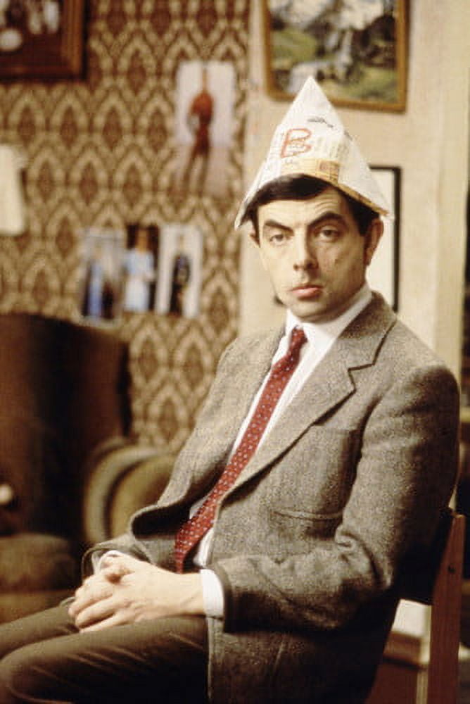 Rowan Atkinson Mr. Bean 24x36 Poster sitting in chair Christmas hat
