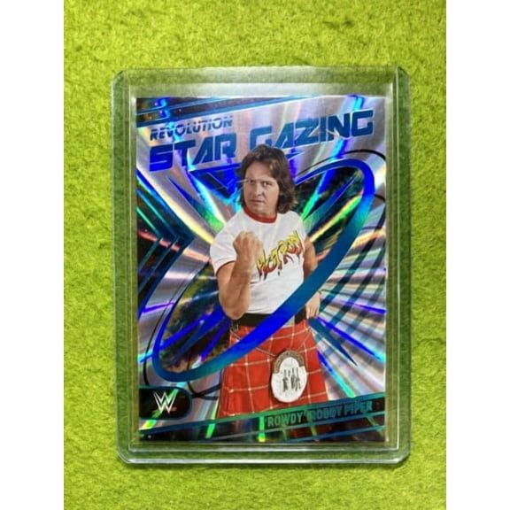 Rowdy Roddy Piper CARD WWE REVOLUTION SUNBURST PRIZM # /99 SP 2023 WWE WWF Card