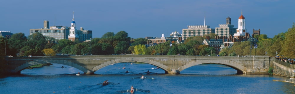 Rowers on Charles River Harvard and Cambridge in BackgroundMassachusetts Canvas Art - Panoramic Images (27 x 9)