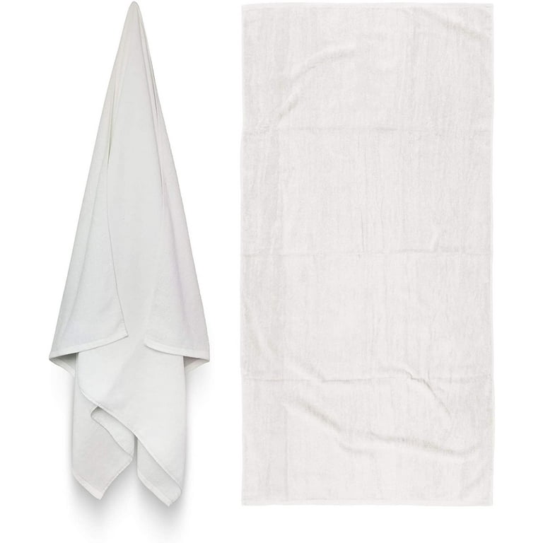 Royal Comfort Over Sized 34x70 Solid Color 2 per Pack White Terry Velour Beach Towel. Made with 100 Cotton Weighing at 19.0 lbs per doz. Why Settle for Polyester get The Real Thing