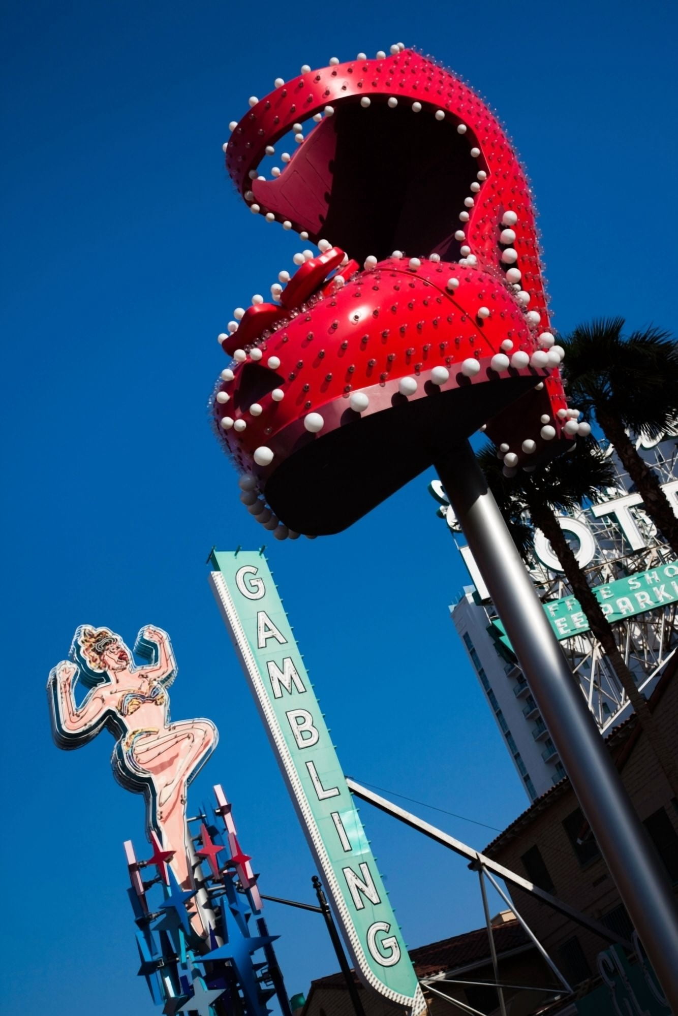 Ruby slipper neon sign in a city El Cortez Hotel and Casino Fremont Street Las Vegas Nevada USA Canvas Art - Panoramic Images (36 x 12)
