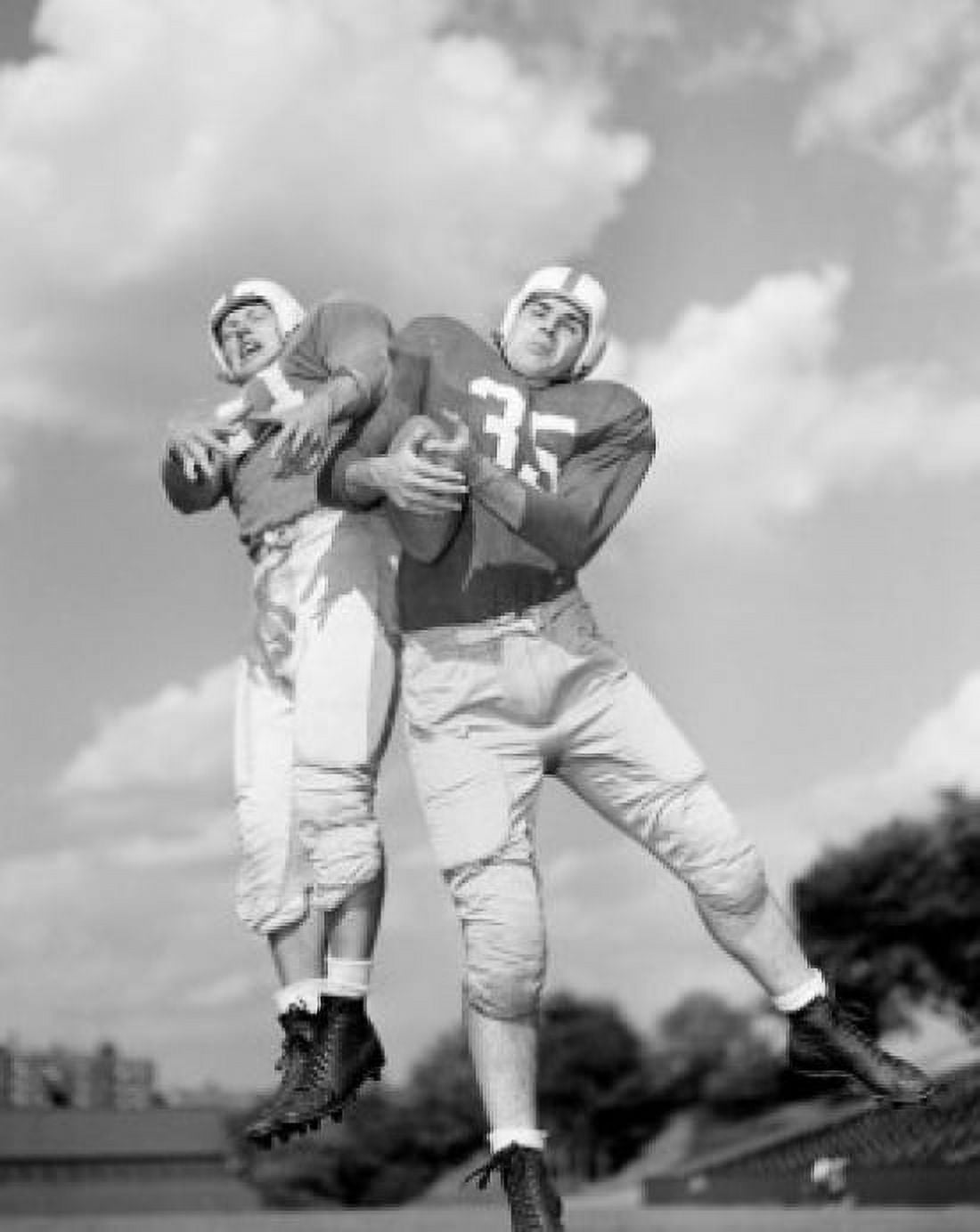 Rugby players trying to catch ball low angle view Canvas Art - (18 x 24)