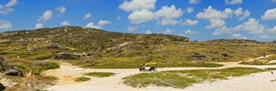 Rugged eastern side of an island Aruba Canvas Art - Panoramic Images (18 x 6)