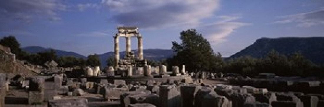 Ruins of a temple The Tholos Delphi Greece Canvas Art - Panoramic Images (18 x 6)