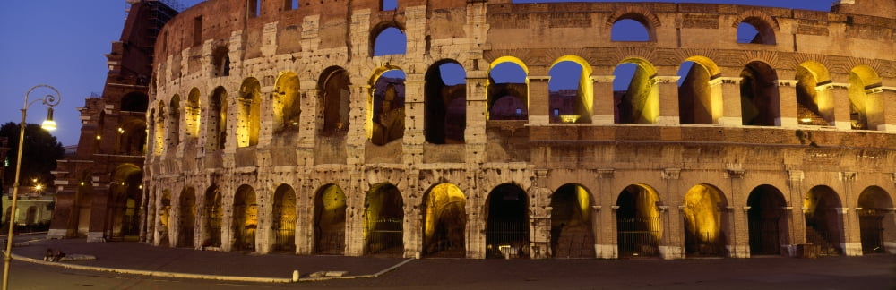 Ruins of an amphitheater Coliseum Rome Lazio Italy Canvas Art - Panoramic Images (12 x 36)