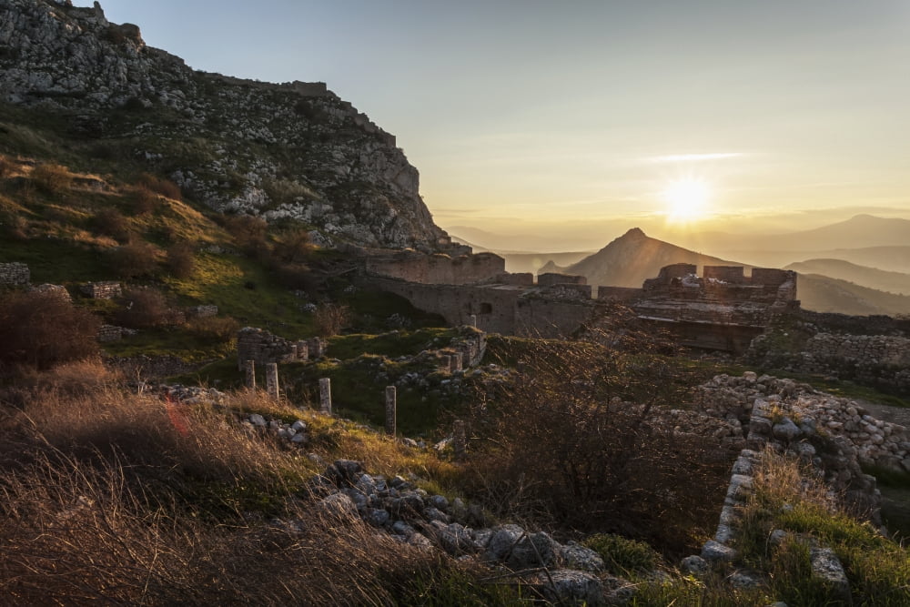 Ruins of stone buildings and walls at sunset Corinth Greece Canvas Art - Reynold Mainse Design Pics (38 x 24)