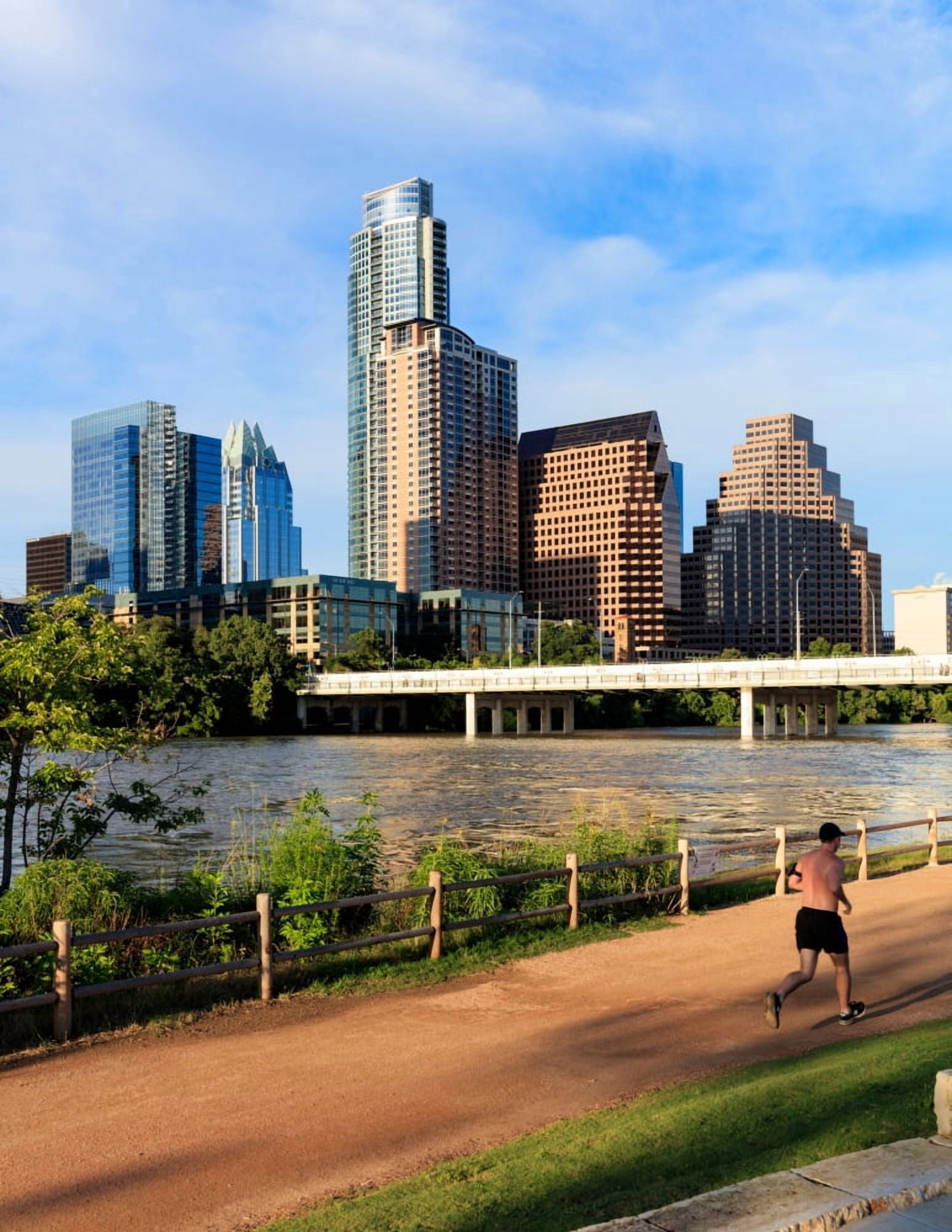 Runner on path along south shore of Lady Bird Lake in downtown Austin Texas USA Canvas Art - Panoramic Images (22 x 28)
