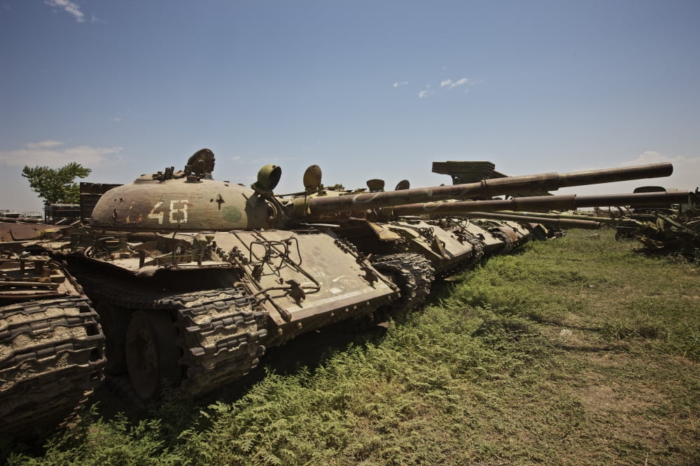 Russian T-62 main battle tanks rest in an armor junkyard Canvas Art - Terry MooreStocktrek Images (18 x 12)