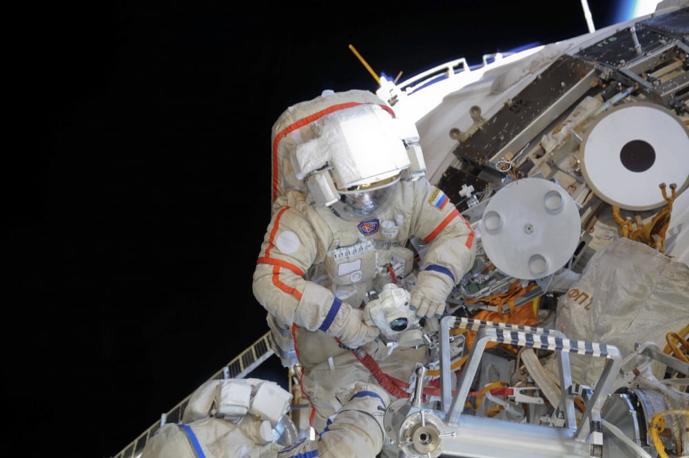 Russian cosmonaut during a session of extravehicular activity Canvas Art - Stocktrek Images (34 x 23)