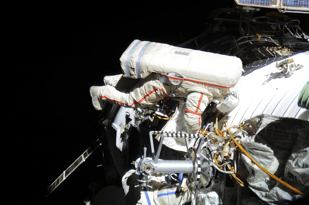 Russian cosmonaut during a session of extravehicular activity Canvas Art - Stocktrek Images (34 x 23)
