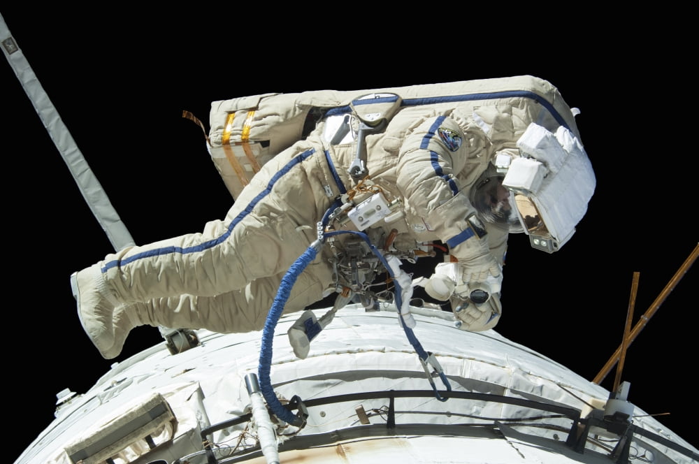 Russian cosmonaut during a spacewalk Canvas Art - Stocktrek Images (35 x 23)