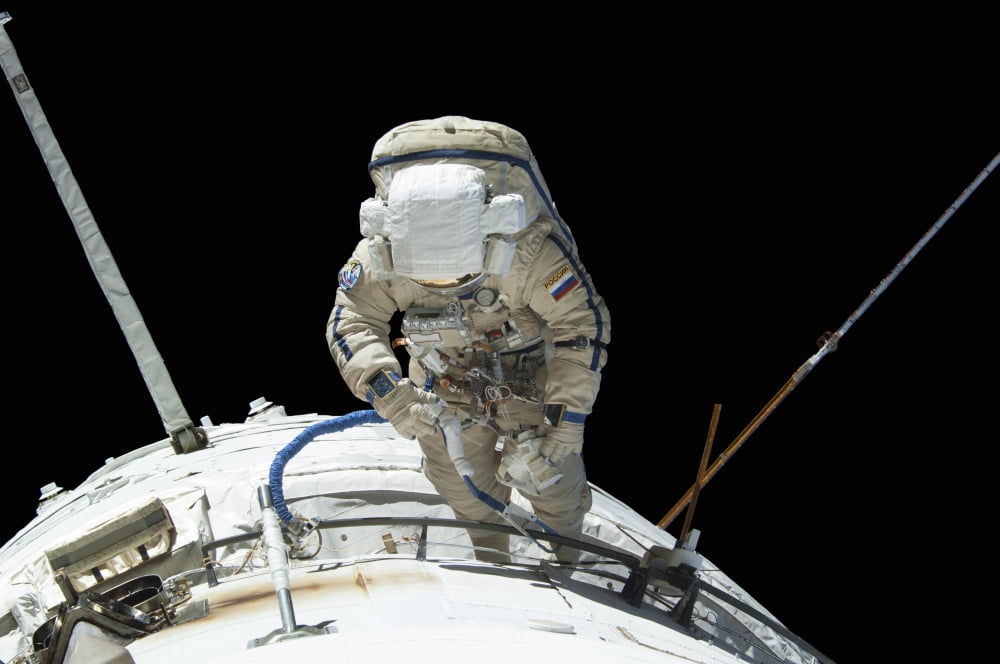 Russian cosmonaut during a spacewalk Canvas Art - Stocktrek Images (35 x 23)