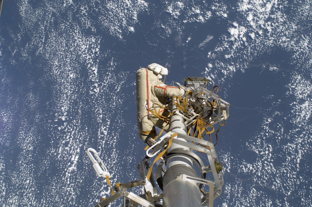 Russian cosmonaut participates in a session of extravehicular activity Canvas Art - Stocktrek Images (35 x 23)