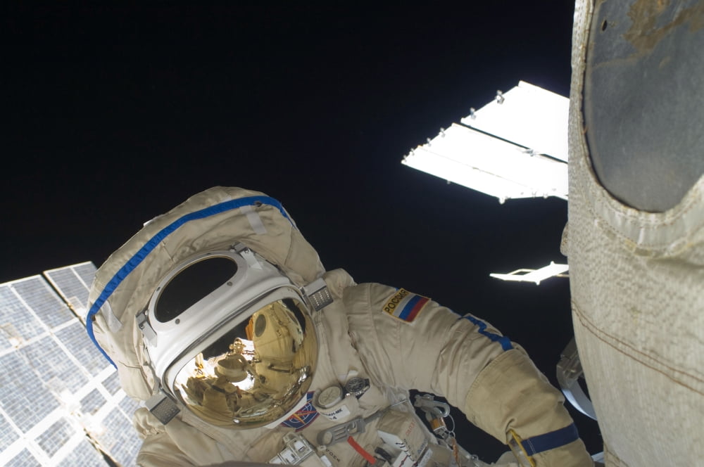 Russian cosmonaut performs a spacewalk Canvas Art - Stocktrek Images (35 x 23)