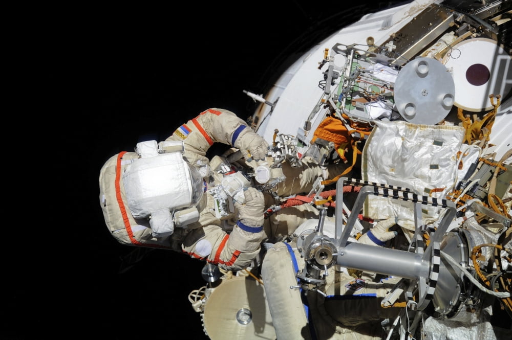 Russian cosmonauts during a session of extravehicular activity Canvas Art - Stocktrek Images (34 x 23)
