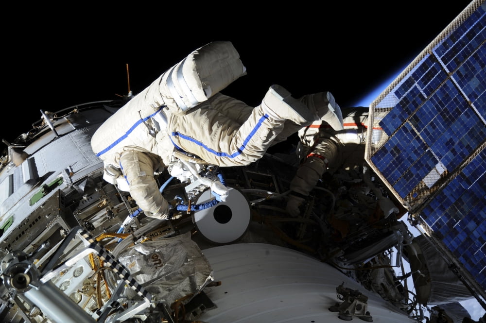Russian cosmonauts during a session of extravehicular activity Canvas Art - Stocktrek Images (34 x 23)