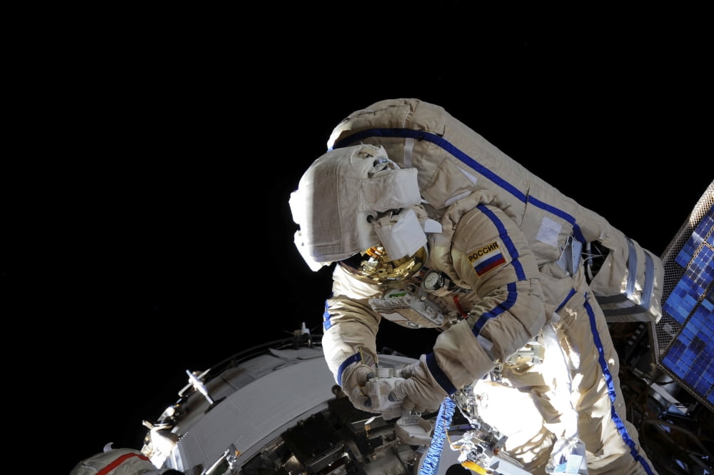 Russian cosmonauts during a session of extravehicular activity Canvas Art - Stocktrek Images (34 x 23)