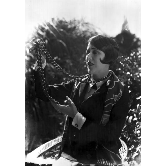 Ruth Roland Watching her Huge Necklace Black and White Photo Print (24 x 30)