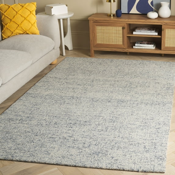 SAFAVIEH Abstract Carina Solid Area Rug, Light Blue/Ivory, 9' x 12'