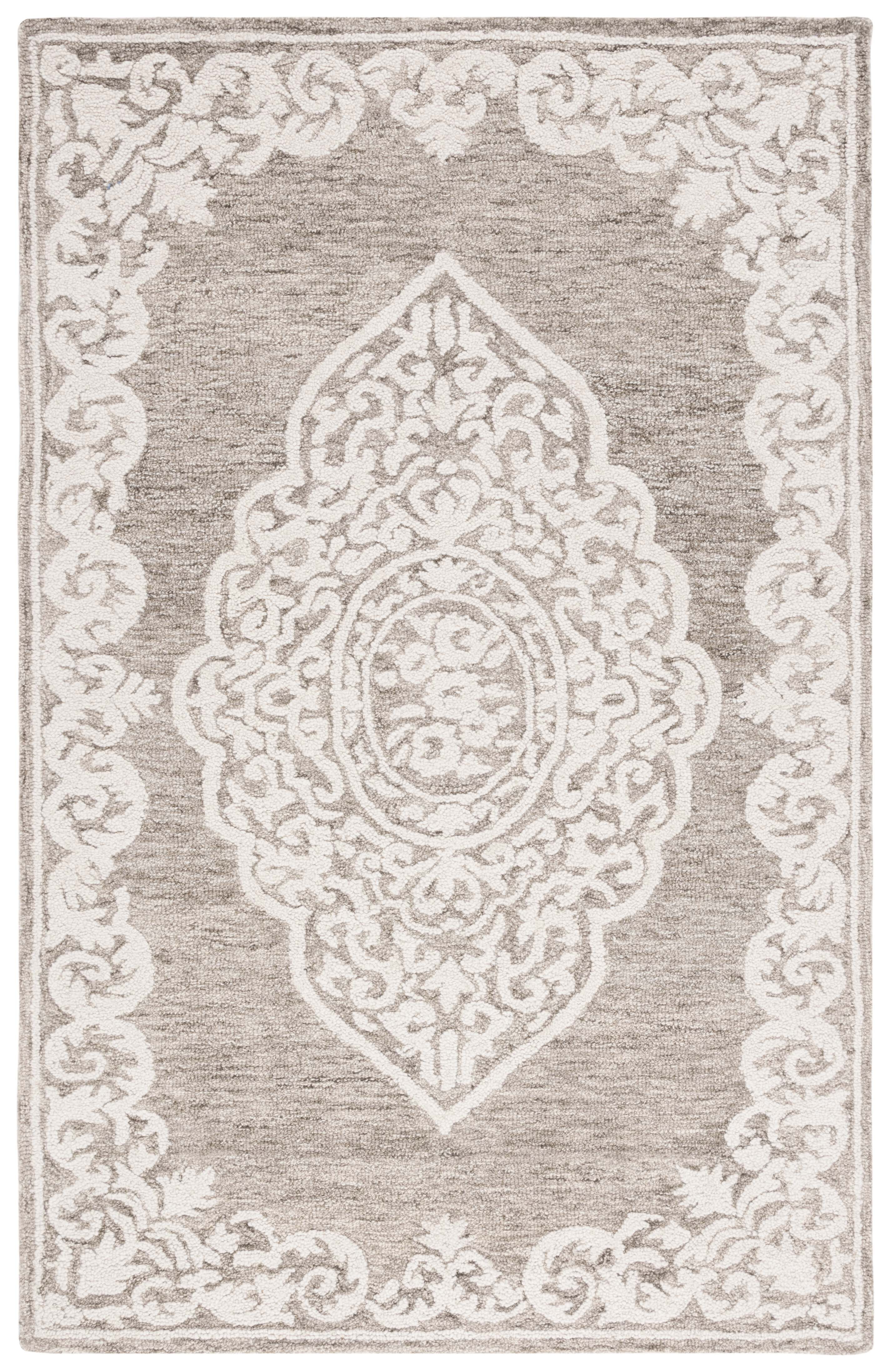 Handmade Ivory Abstract Tufted Wool Round Rug