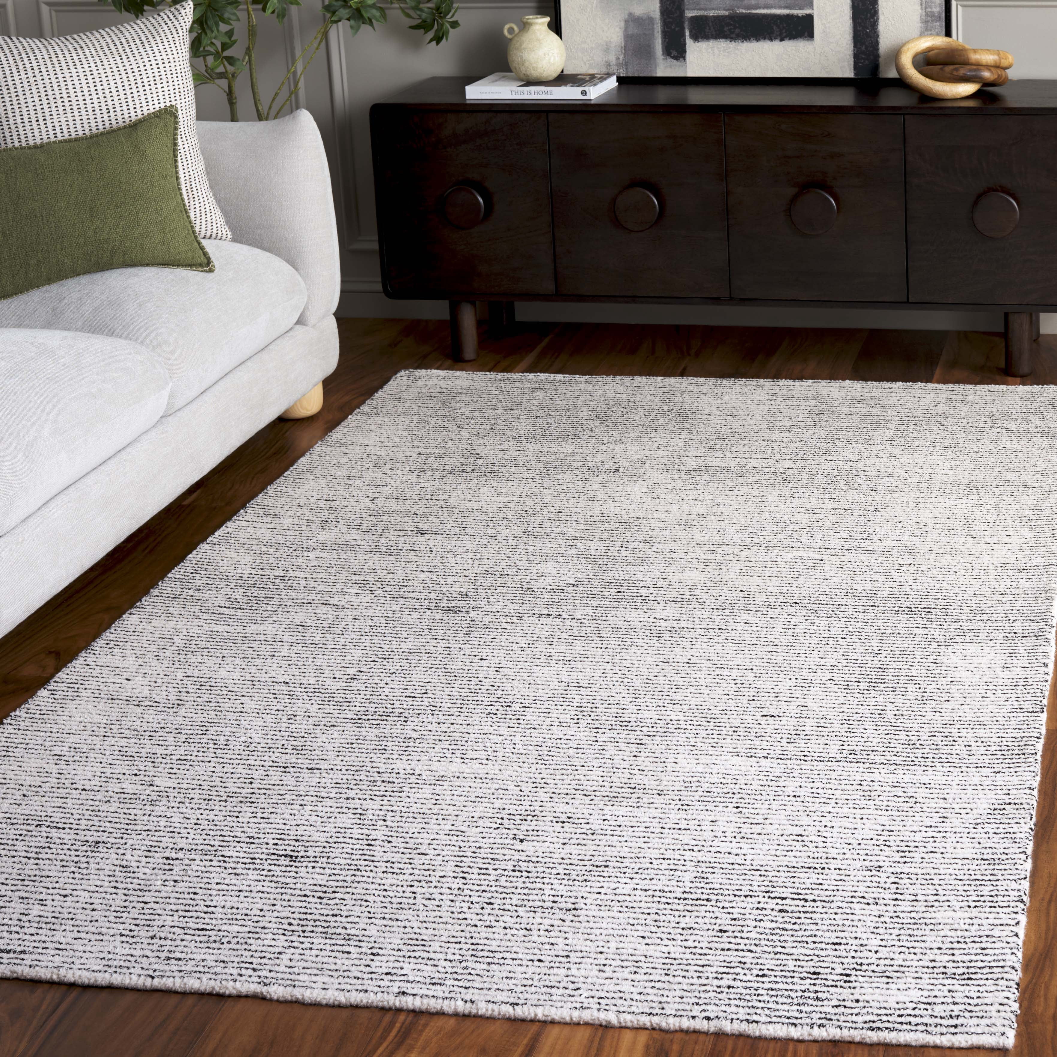 SAFAVIEH Abstract Rumen Solid Color Area Rug, Ivory/Black, 3' x 5'