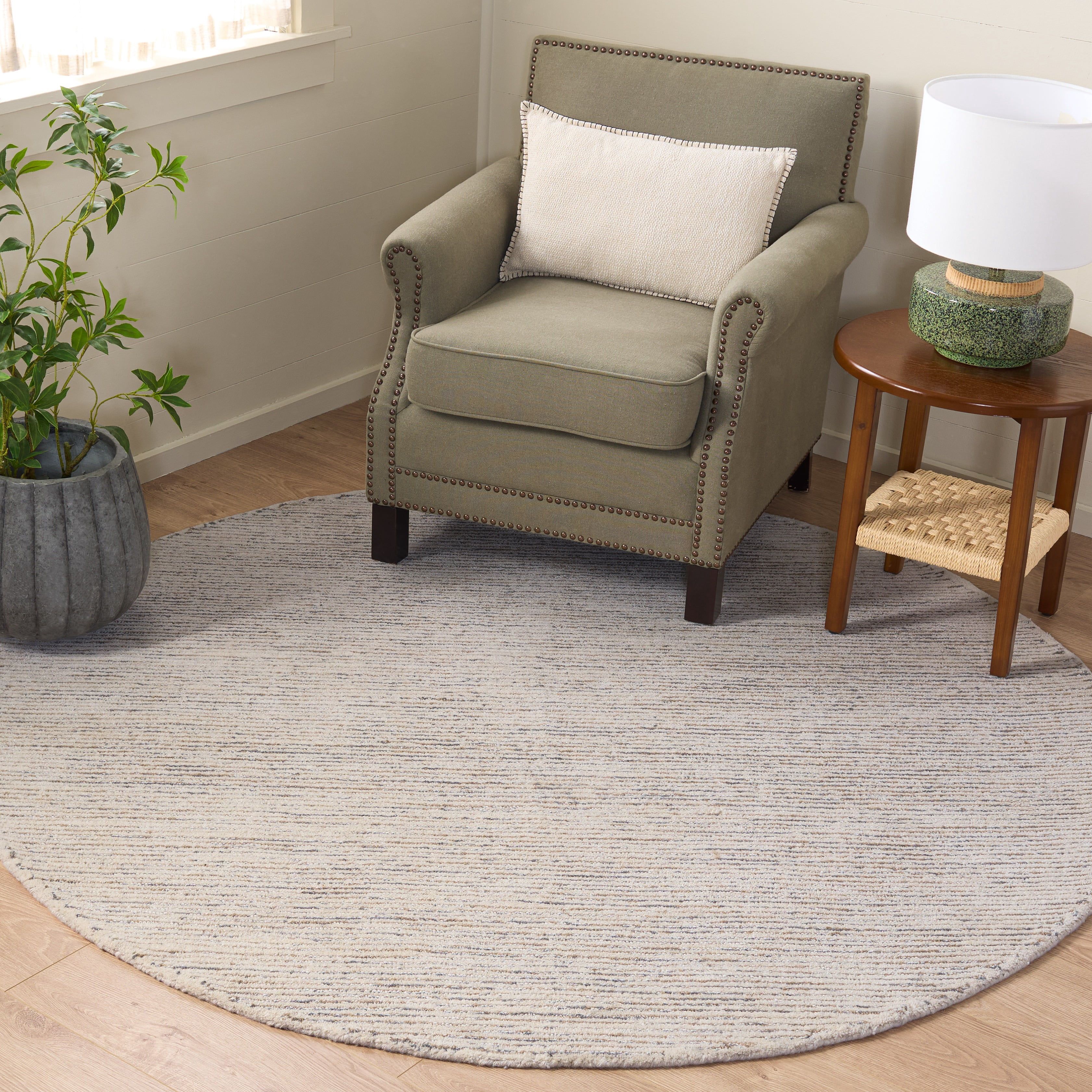 SAFAVIEH Abstract Rumen Solid Color Area Rug, Ivory/Taupe, 6' x 6' Round