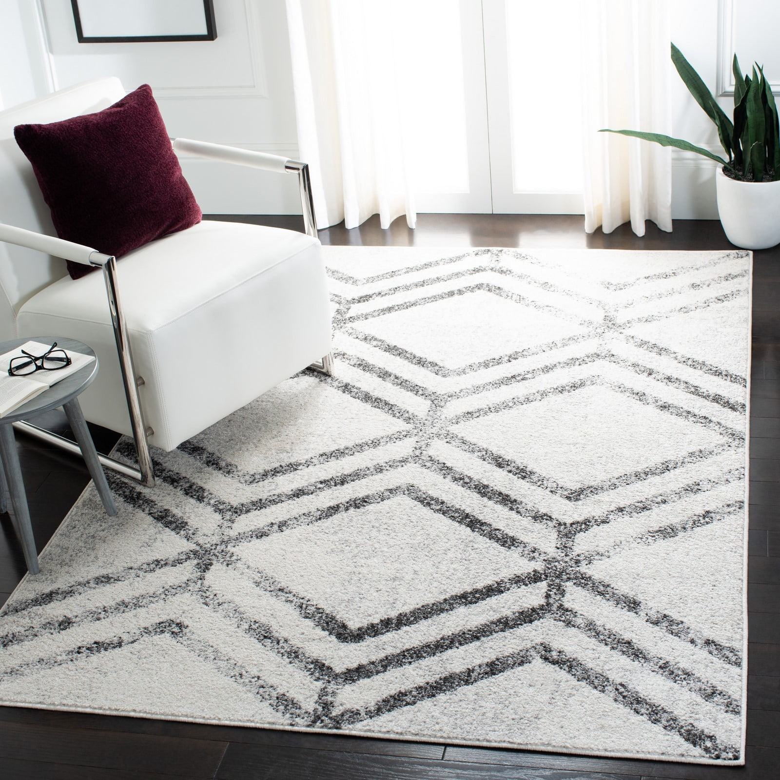 Ivory and Grey Geometric 8' x 10' Synthetic Area Rug