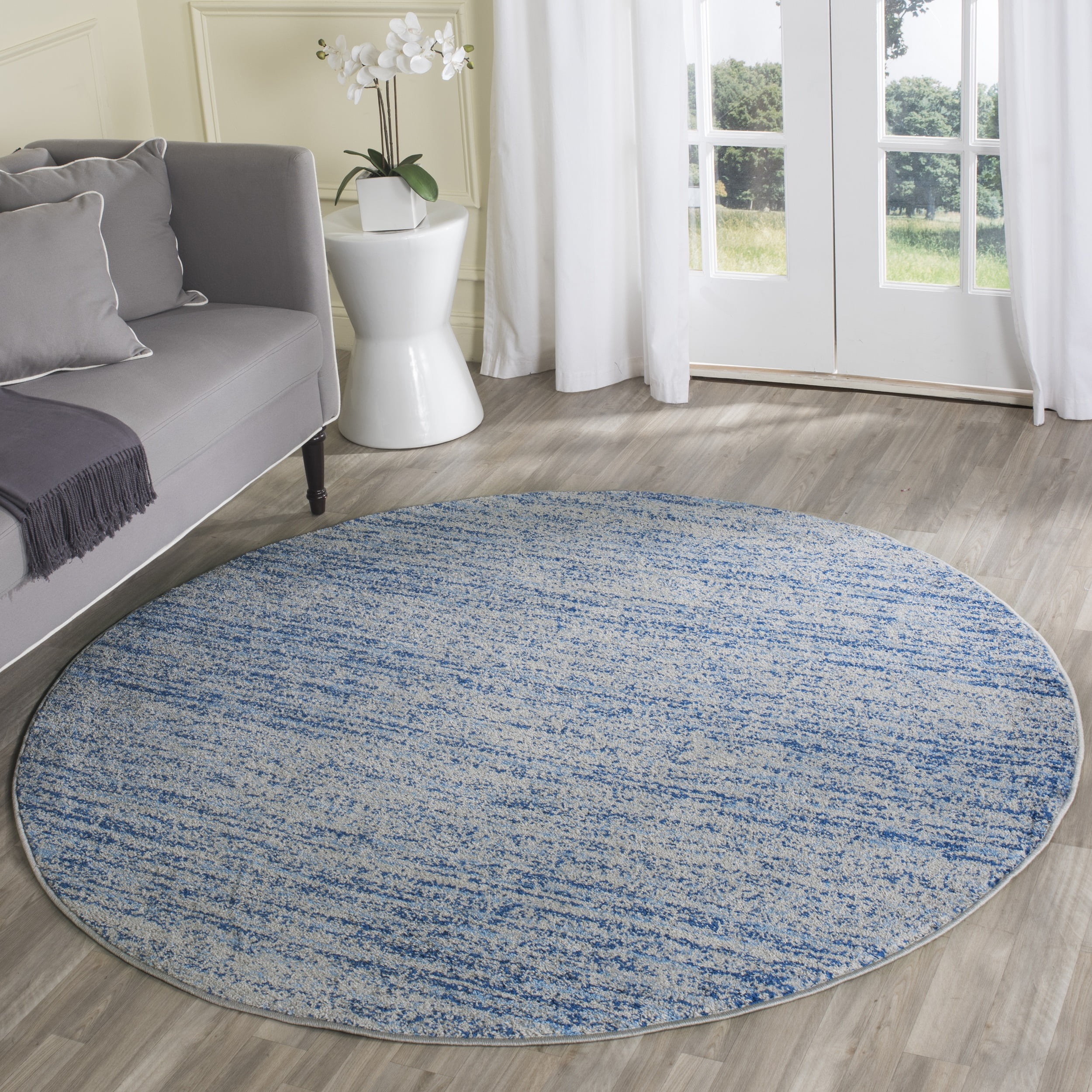 47" Round Blue Synthetic Easy Care Area Rug