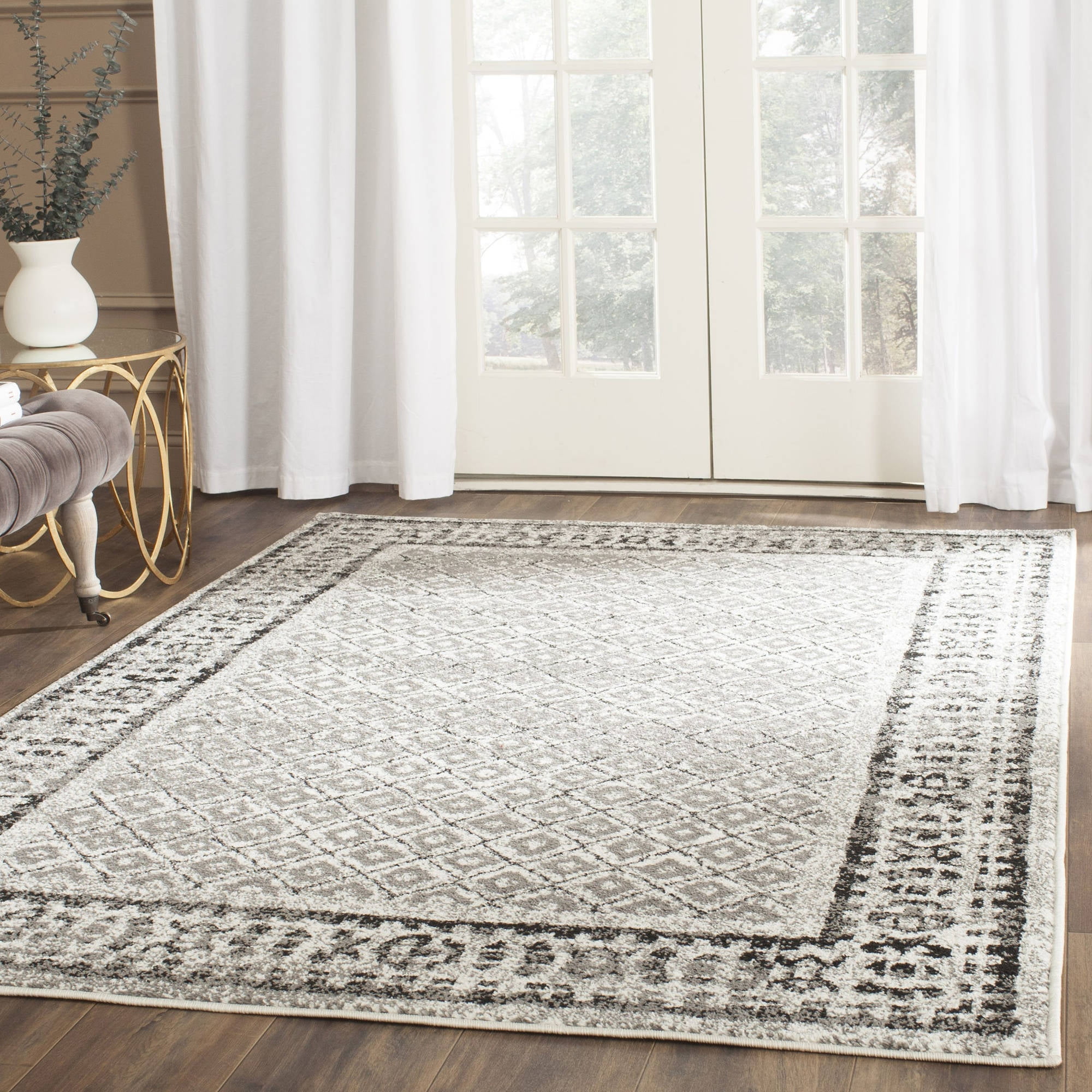 Ivory and Silver Geometric 9' x 12' Synthetic Area Rug