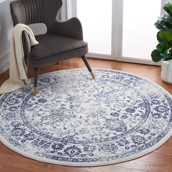 SAFAVIEH Adirondack Wyatt Traditional Distressed Area Rug, Ivory/Navy, 10' x 10' Round - Large - Transitional Modern Design, Ivory & Navy, Ideal for Living Room, Bedroom, Dining Space