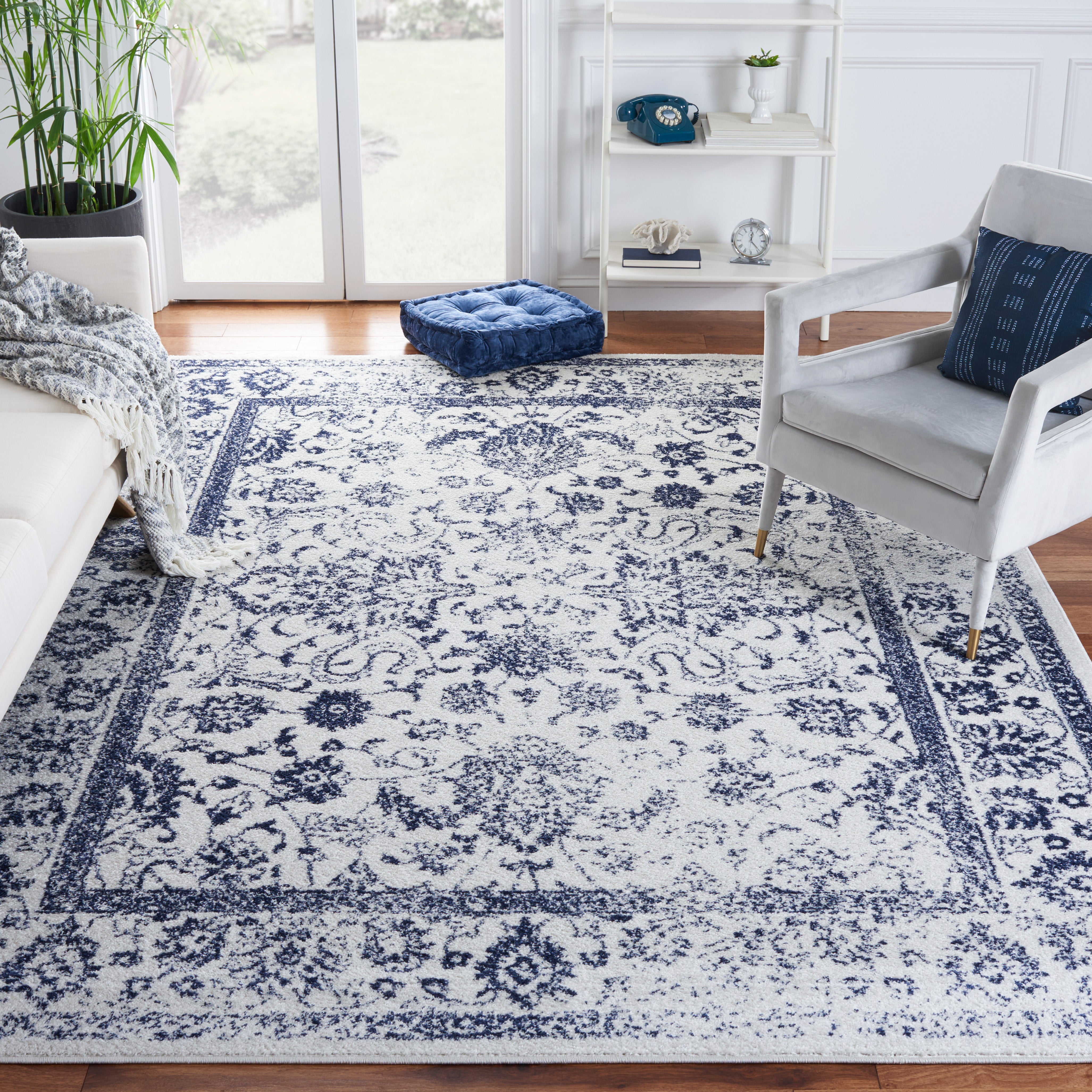 SAFAVIEH Adirondack Wyatt Traditional Distressed Area Rug, Ivory/Navy, 8' x 10' - Large - Transitional Modern Design, Ivory & Navy, Ideal for Living Room, Bedroom, Dining Space