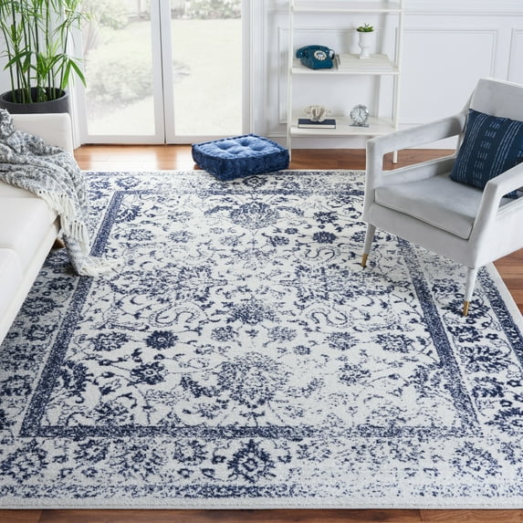 SAFAVIEH Adirondack Wyatt Traditional Distressed Area Rug, Ivory/Navy, 8' x 10' - Large - Transitional Modern Design, Ivory & Navy, Ideal for Living Room, Bedroom, Dining Space