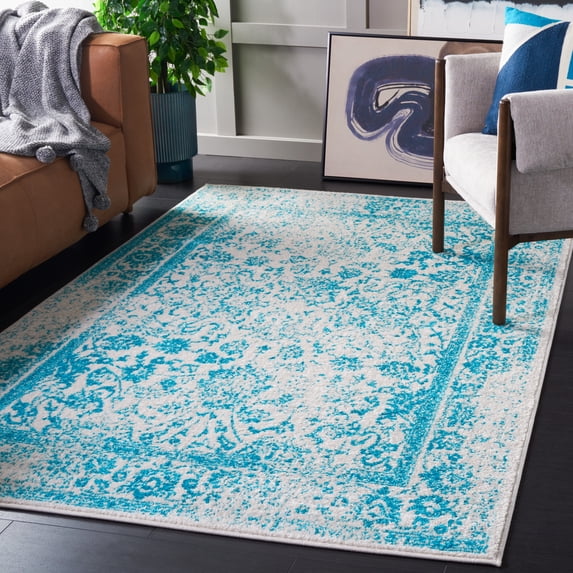 SAFAVIEH Adirondack Wyatt Traditional Distressed Area Rug, Ivory/Teal, 6' x 9' - Transitional Modern Design, Ivory & Teal, Ideal for Living Room, Bedroom, Dining Space