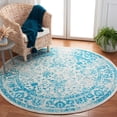 thumbnail image 1 of SAFAVIEH Adirondack Wyatt Traditional Distressed Area Rug, Ivory/Teal, 4' x 4' Round - Transitional Modern Design, Ivory & Teal, Ideal for Living Room, Bedroom, Dining Space, 1 of 12