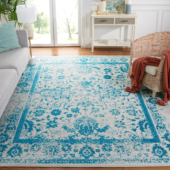SAFAVIEH Adirondack Wyatt Traditional Distressed Area Rug, Ivory/Teal, 9' x 12' - Large - Transitional Modern Design, Ivory & Teal, Ideal for Living Room, Bedroom, Dining Space
