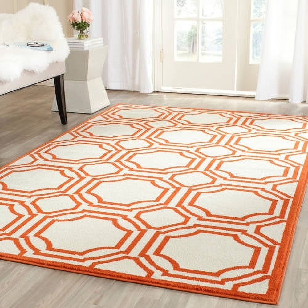 Ivory and Orange Geometric Synthetic Area Rug