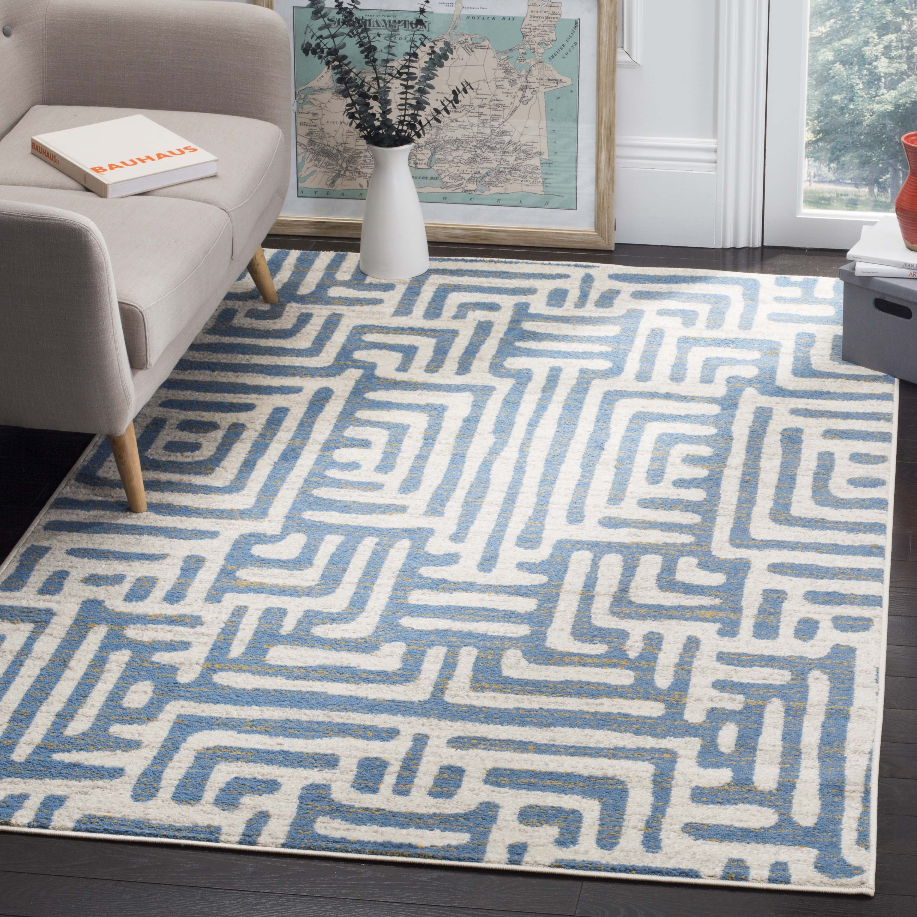 Ivory and Light Blue Geometric Synthetic Area Rug 3' x 5'