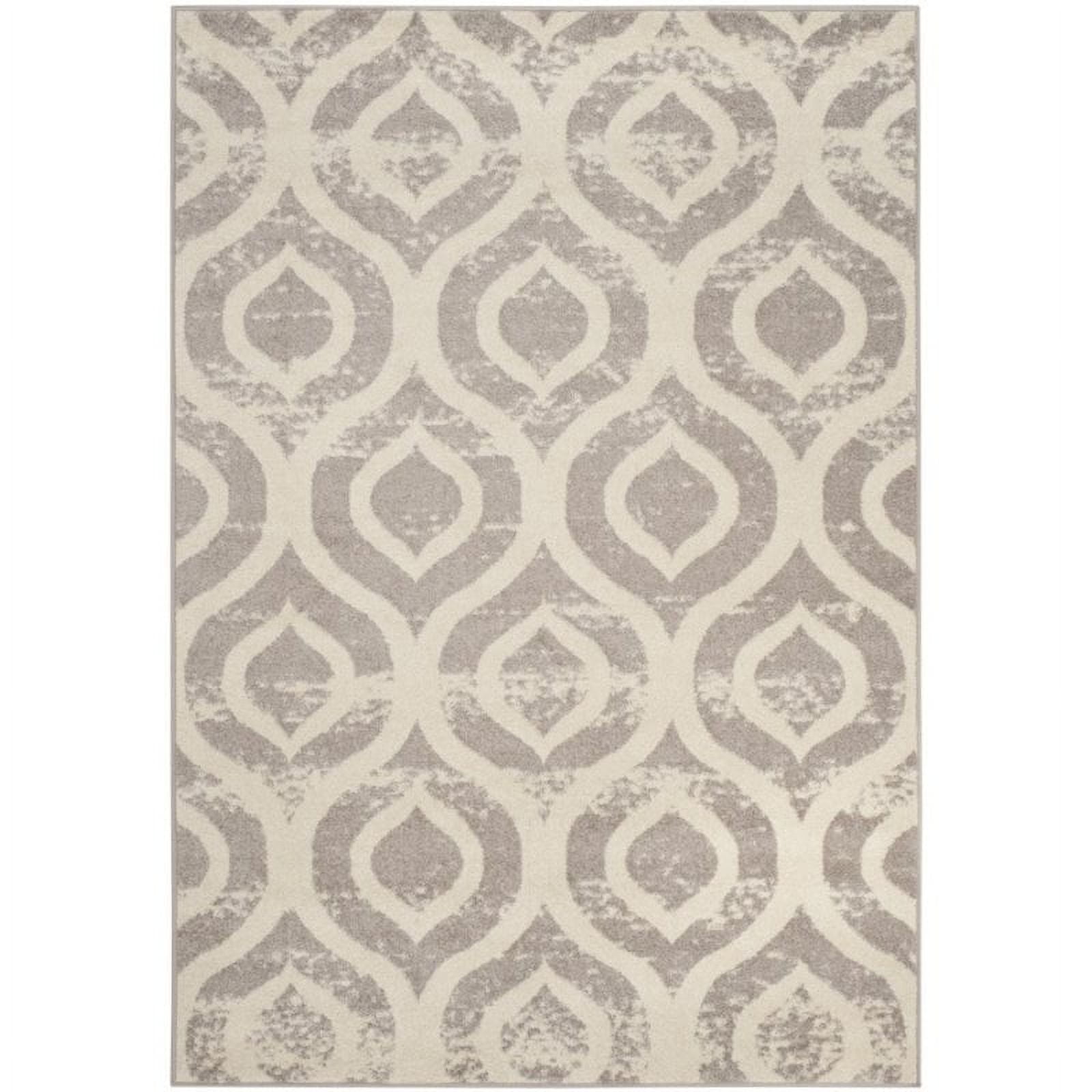 Ivory and Mauve Geometric Low Pile Area Rug